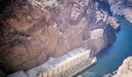 Looking down the face of the Hoover Dam at the Colorado River flowing