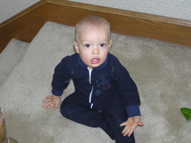 Jacob hangs out on the stairs