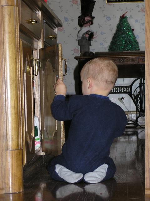 Jacob explores the Hanson's cabinets