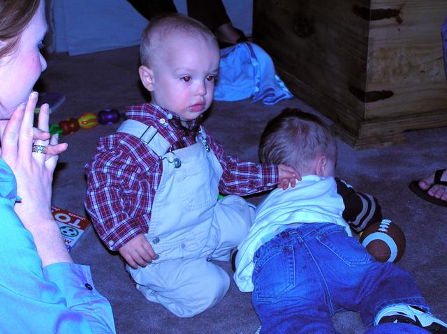 Jacob and Ben fight for the football