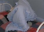 Jacob plays peek-a-boo on his bed