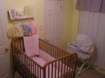 Lacy's crib and bassinet, along with three borrowed sweaters, ready for Lacy to use