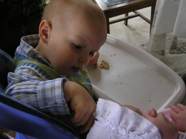 Jacob takes a peek at Lacy while he finishes eating