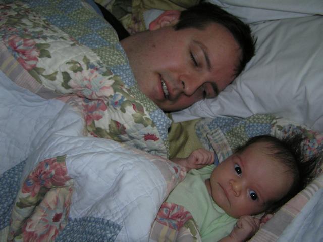 Lacy relaxes with Daddy early one morning