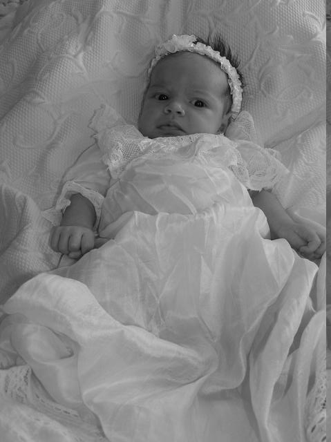 Lacy gets her picture taken in Grandpa Hanson's christening outfit