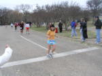 Kathy runs by the 12 mile mark at White Rock Lake
