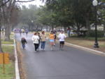 Kathy's sisters join her at the 22 mile mark along Swiss Avenue